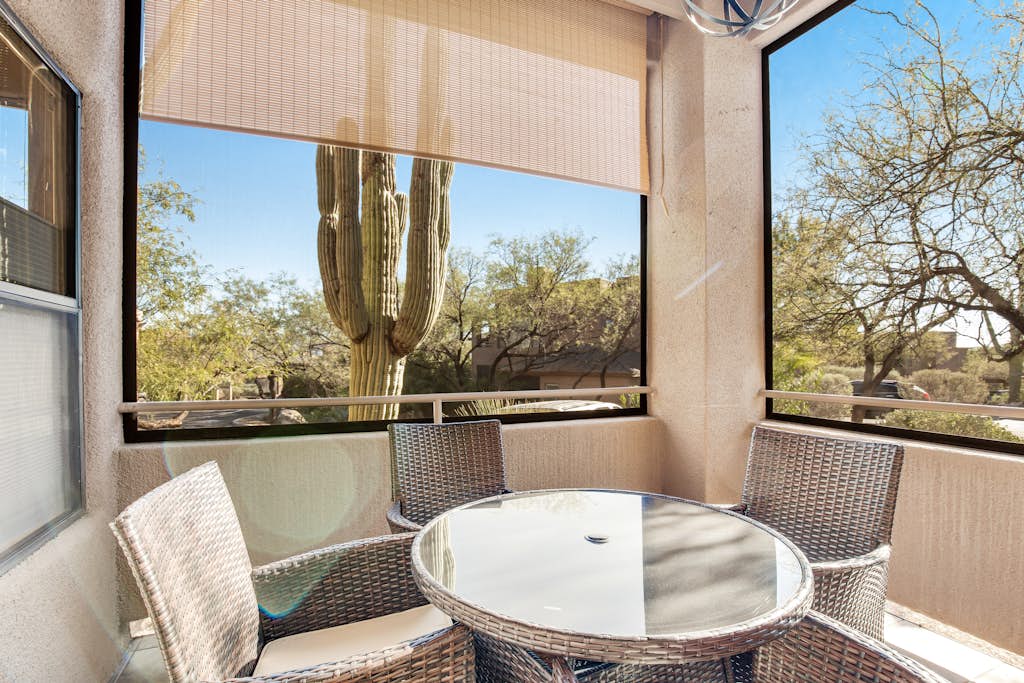 Radiant retreat with pool and hot tub access, sunroom, washer/dryer, gym, & AC