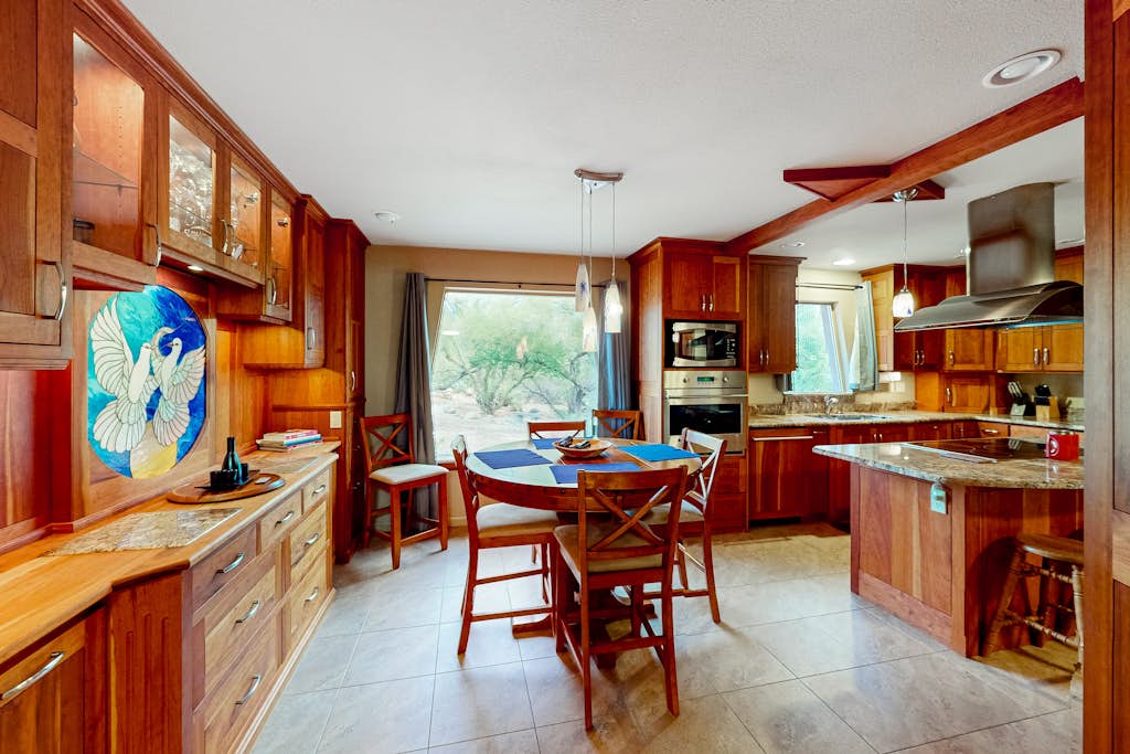 Mountain view home with private pool, tranquil patio & beautiful kitchen