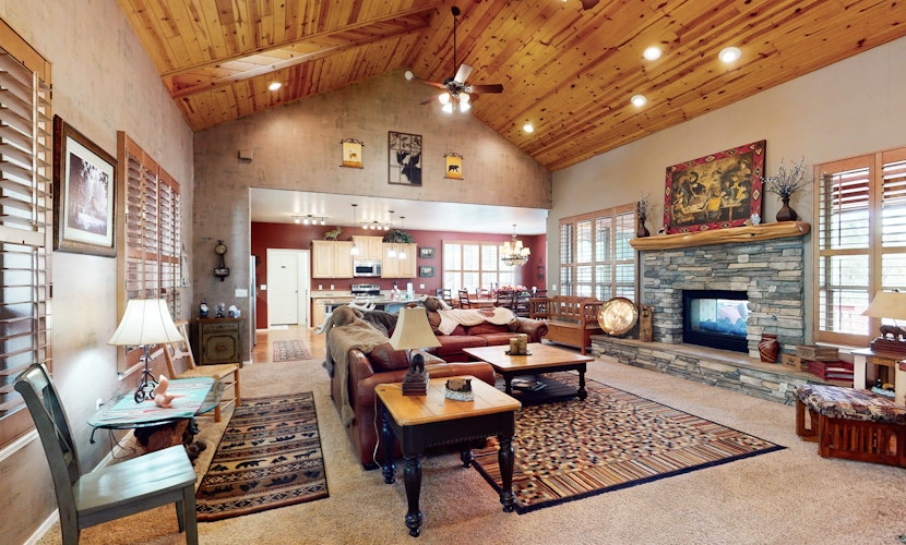 Spacious home with fireplace, multiple patios, balcony & grill