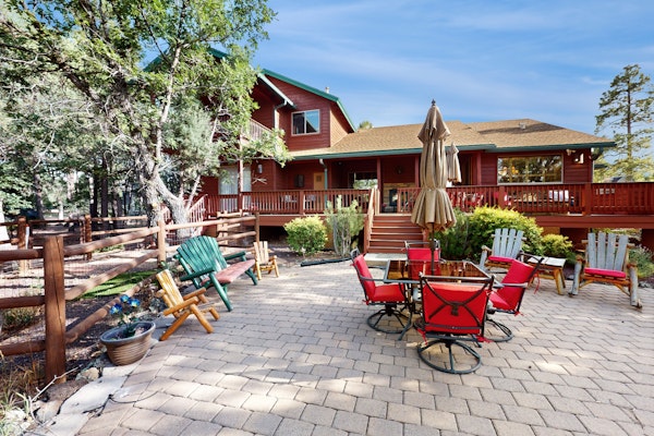 Spacious home with fireplace, multiple patios, balcony & grill