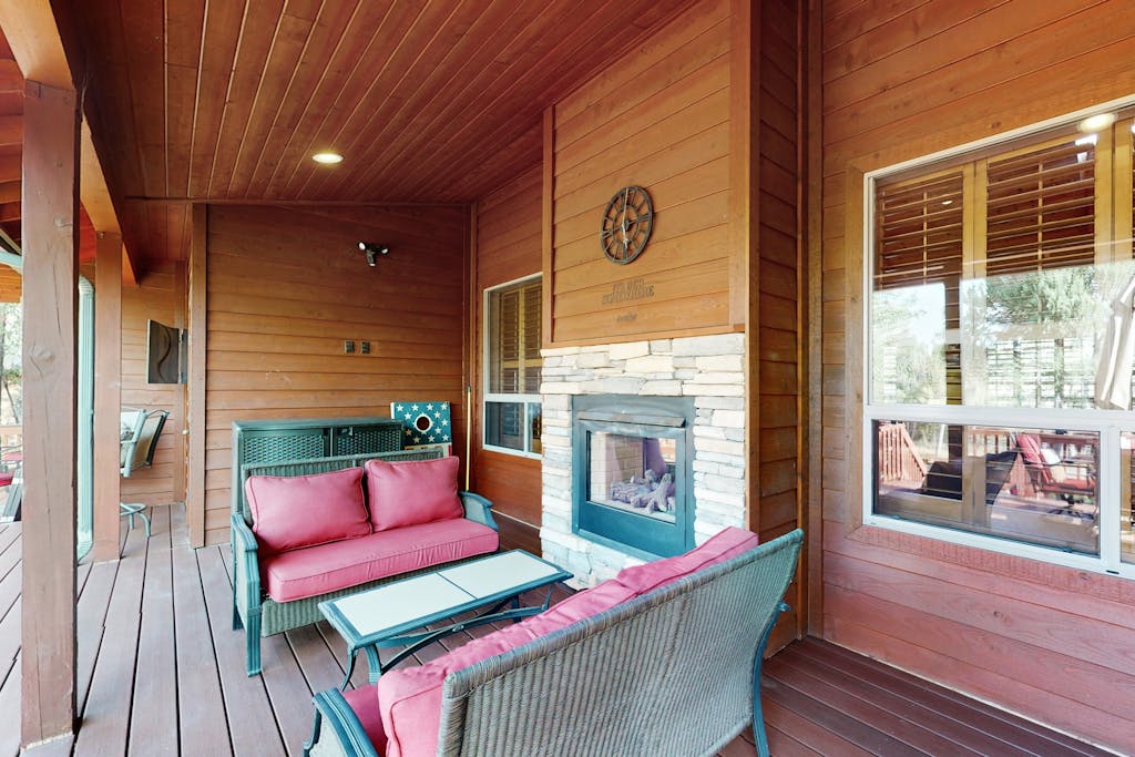 Spacious home with fireplace, multiple patios, balcony & grill