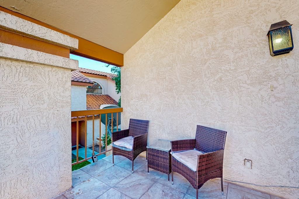 Gated-entry condo with central location, central AC, & private W/D