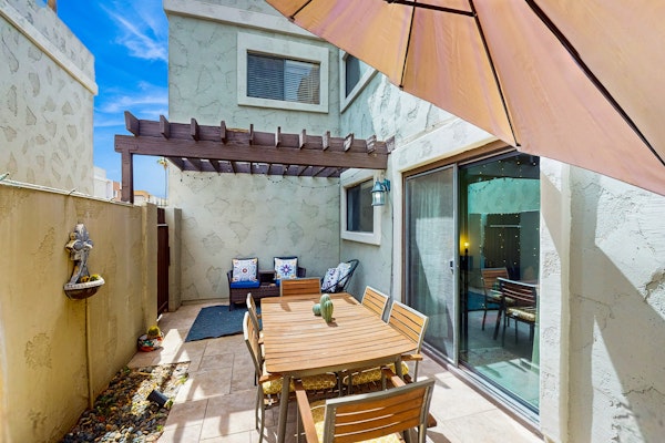 Ground floor condo w/ private patio & direct access to shared pool, dog-friendly
