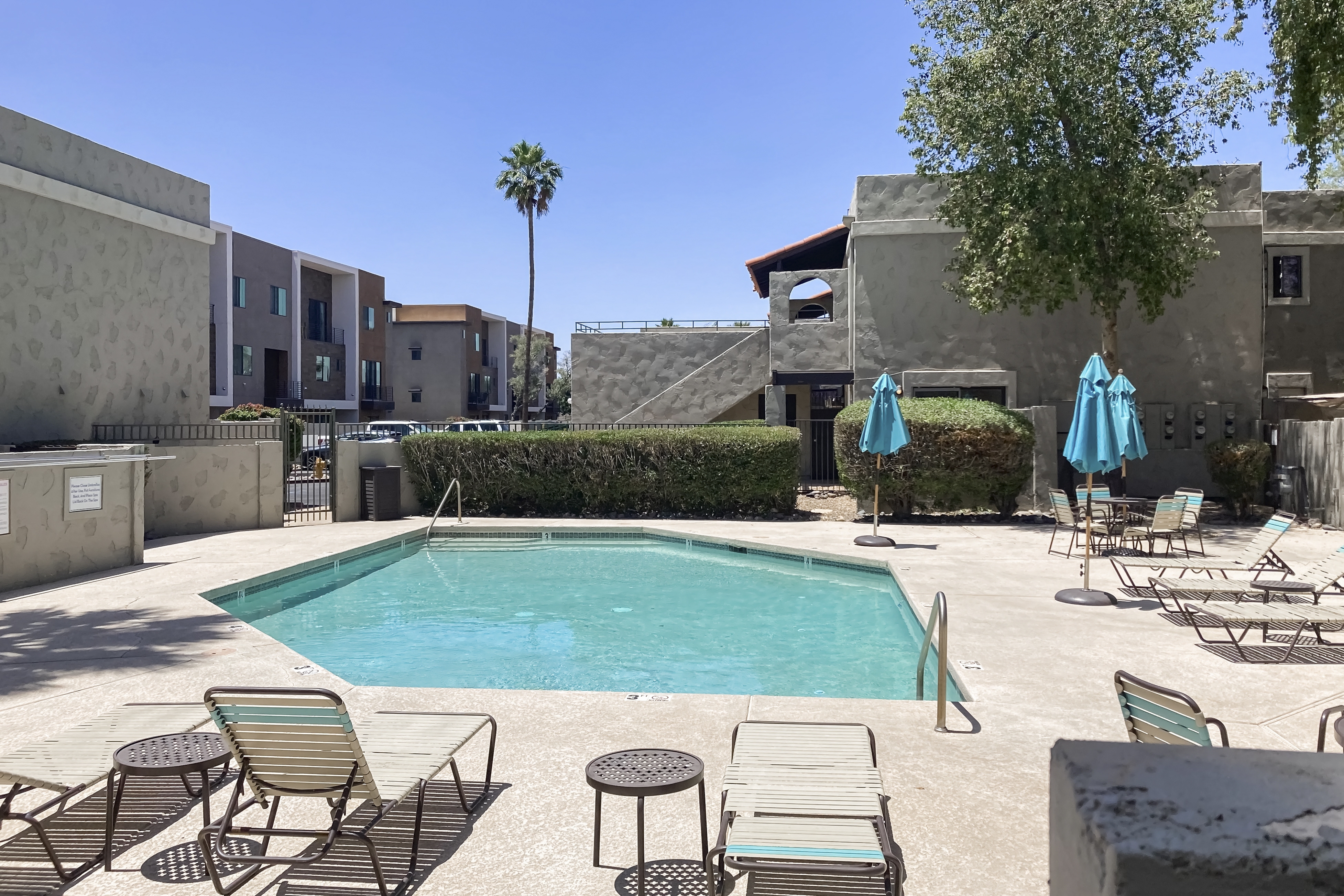 Ground floor condo w/ private patio & direct access to shared pool, dog-friendly