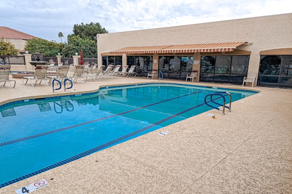 Dog-friendly, golf course adjacent home with a pool, hot tub, & fitness center