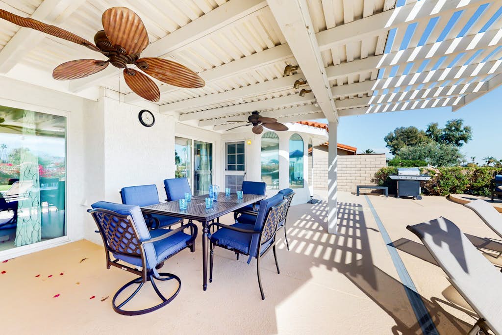 Golf course-front home with private pool, pool spa, fireplace, grill, & hammock