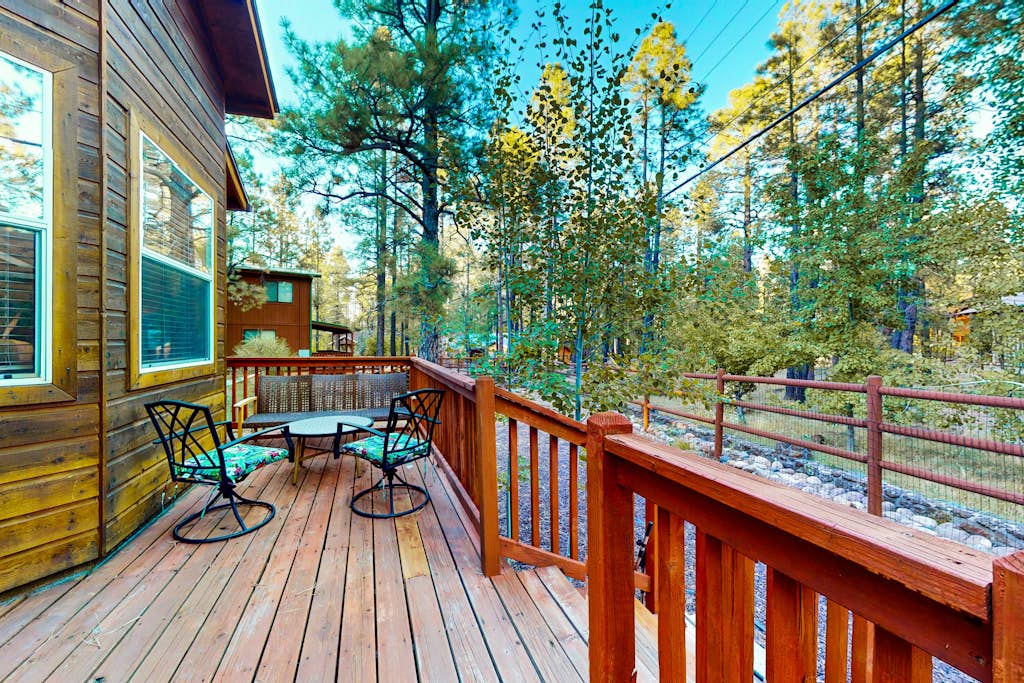 Dog-friendly forested home with wraparound deck, pool table