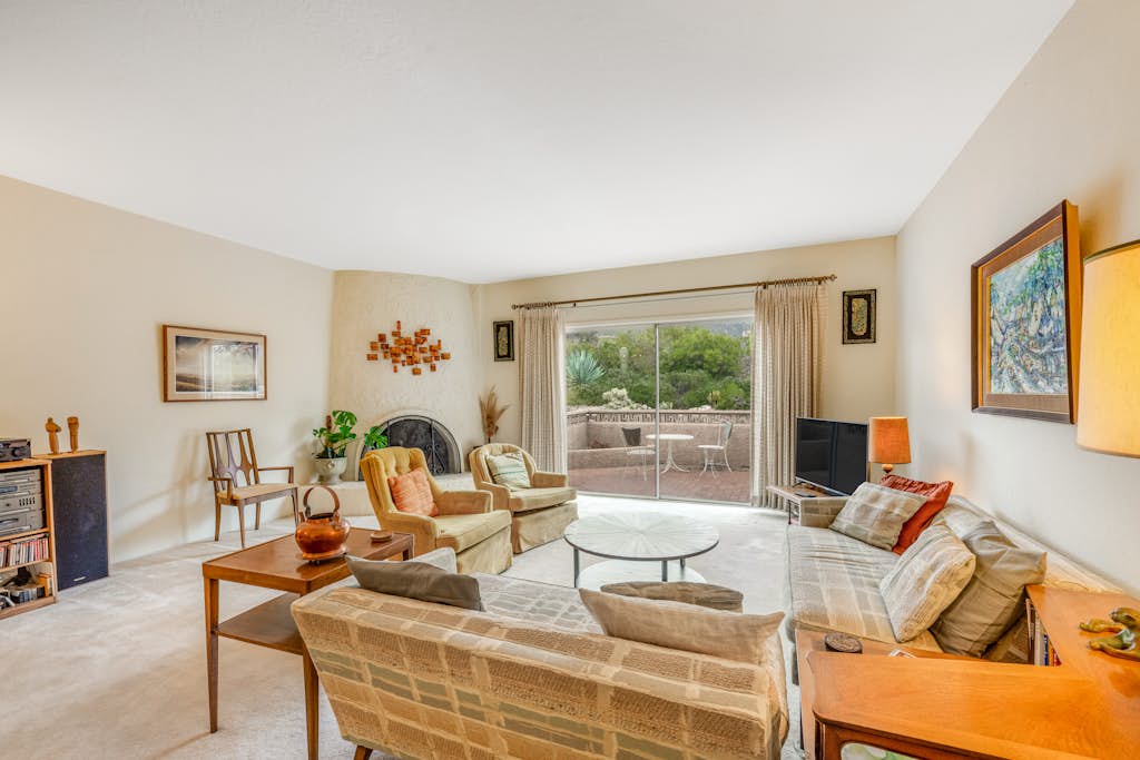 Inviting townhouse with pool, enclosed yard, patio, mountain view & W/D