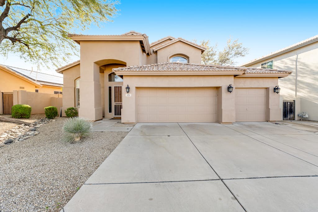 Private pool home with walled yard, firepit, grill & lanai - dog-friendly