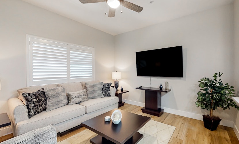 Chic dog-friendly condo with pool, central AC, washer/dryer, & grill