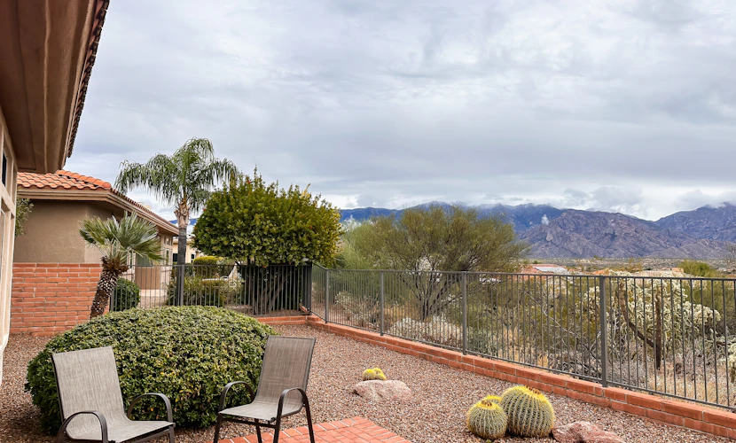 Mountain-view home with on-site pool/hot tub, private yard, patio