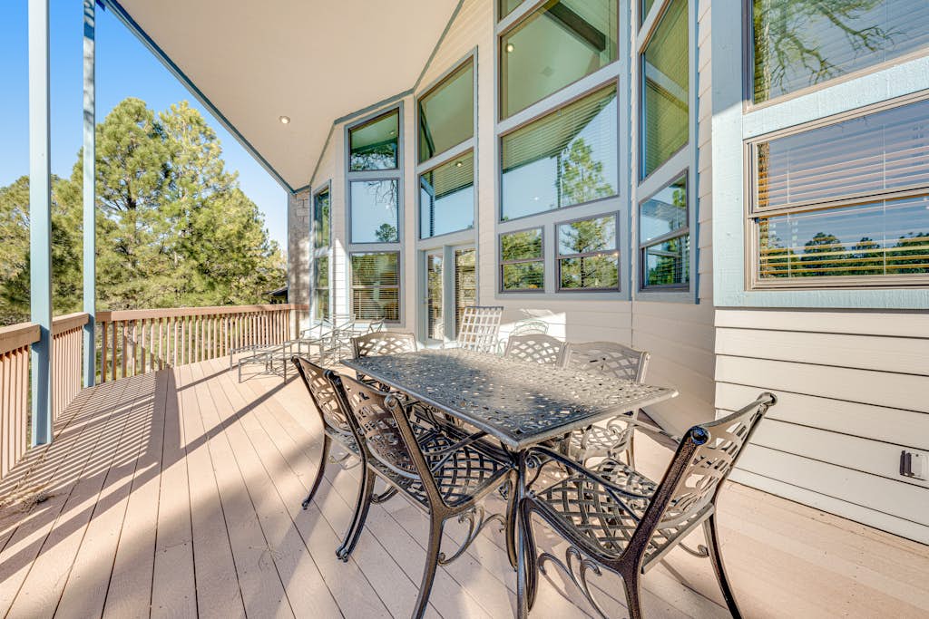 Stunning home with golf views, large deck, fireplace, W/D & central AC