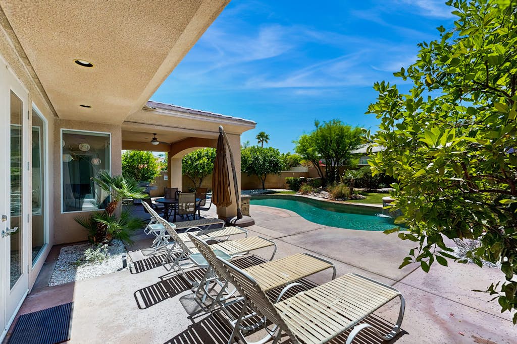 Oasis-style, dog-friendly home w/ a furnished patio, yard, private pool, & spa