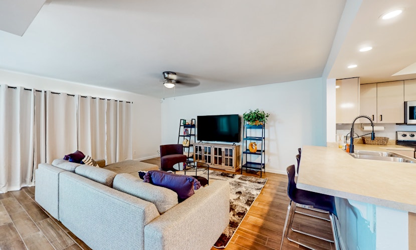 Ground-floor townhome with private yard/patio & on-site pools - dog-friendly