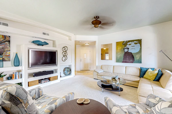 Second-floor condo with heated pool, hot tub, balcony, central AC & washer/dryer