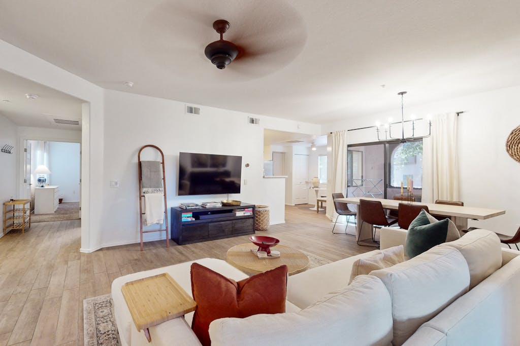 Modern ground-level townhome with two screened patios, grill, pool & hot tub