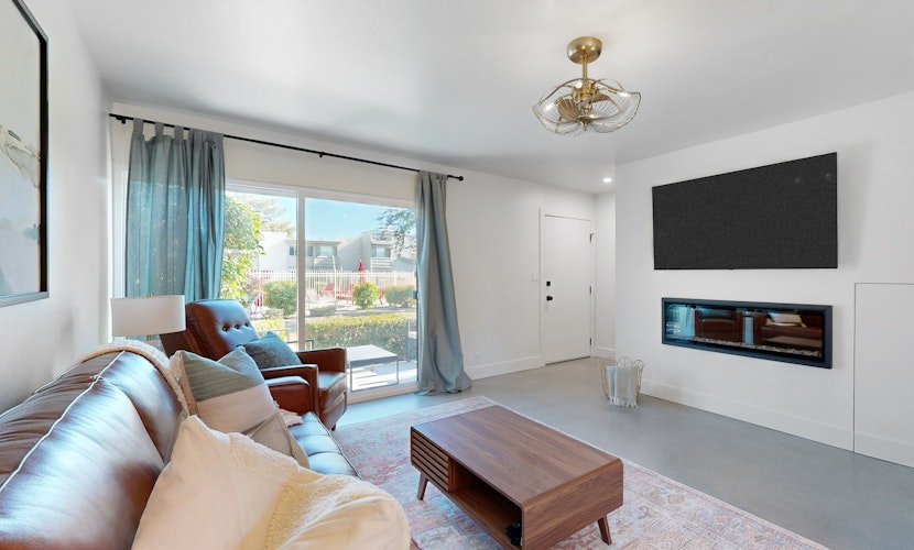 Fully remodeled condo near Fashion Square with pool, fireplace, patio, streaming