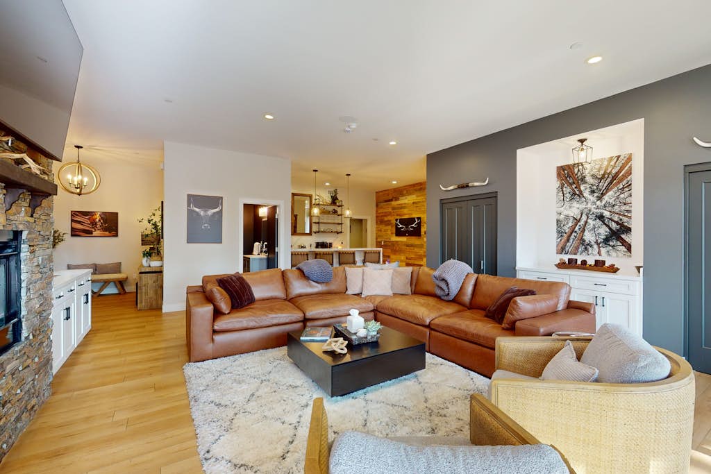 Updated luxury home with ensuite bedrooms, fireplace, & large deck w/ firepit