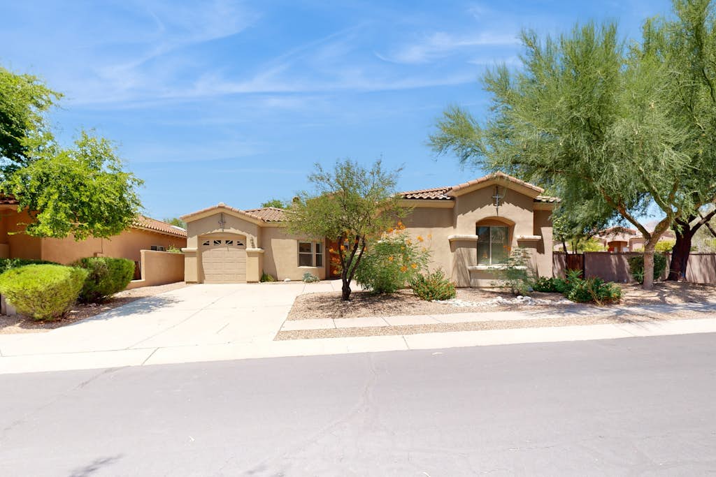 Luxurious remodeled home with gas fireplaces, patios, outdoor kitchen, & pool