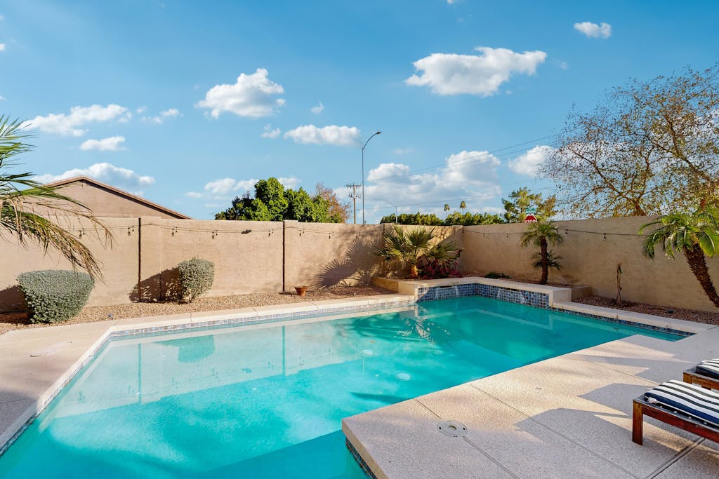 A Comfortable Mesa Escape with a Private Pool, Game Room, and Access to Shops