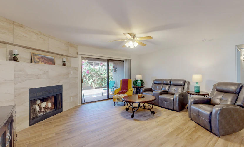 First floor condo with pool/hot tub, private yard, central location