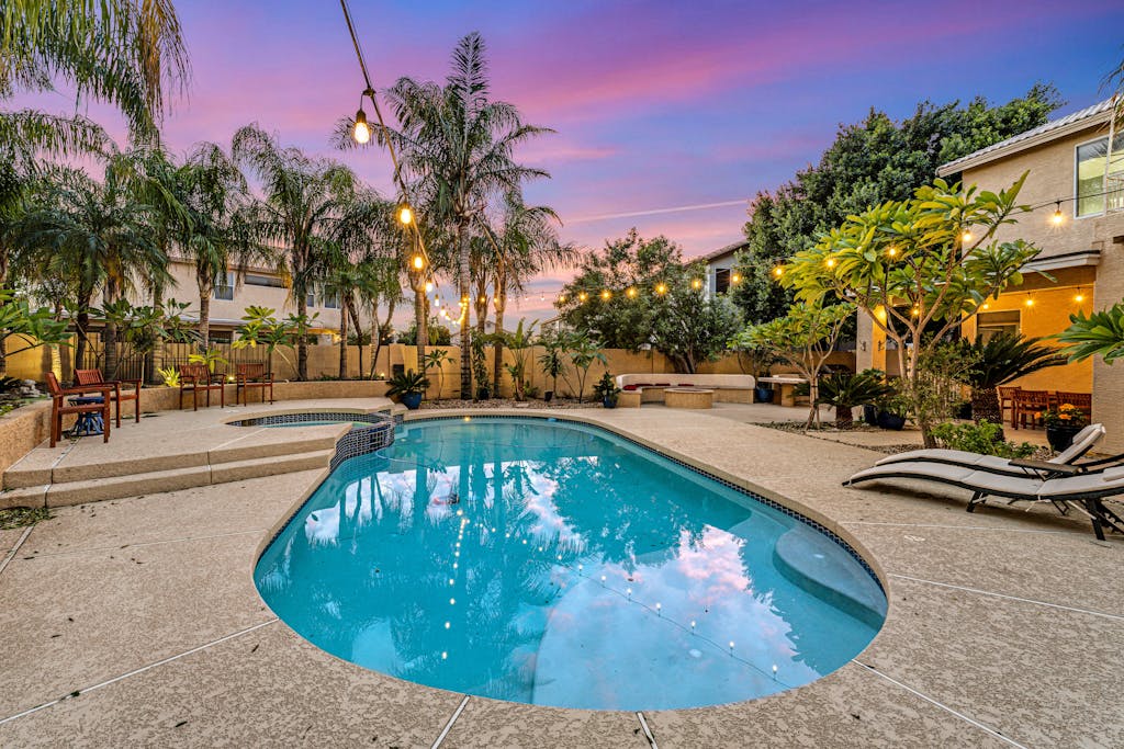 Exquisite home with firepit, game room, heated pool, pool spa, & putting green