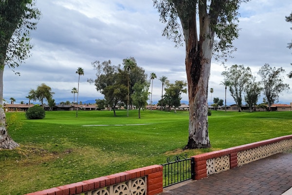 Snowbird-friendly golf-front home with pool, hot tub, grill, smart TVs, W/D, AC