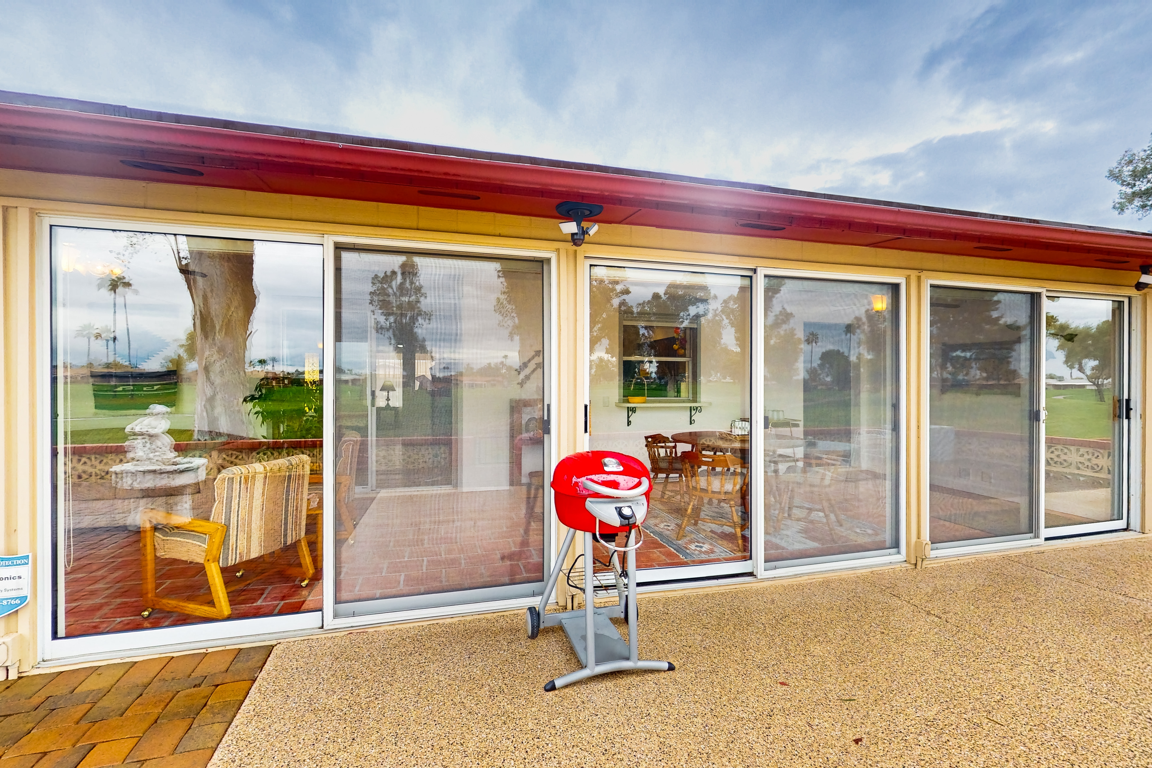 Snowbird-friendly golf-front home with pool, hot tub, grill, smart TVs, W/D, AC