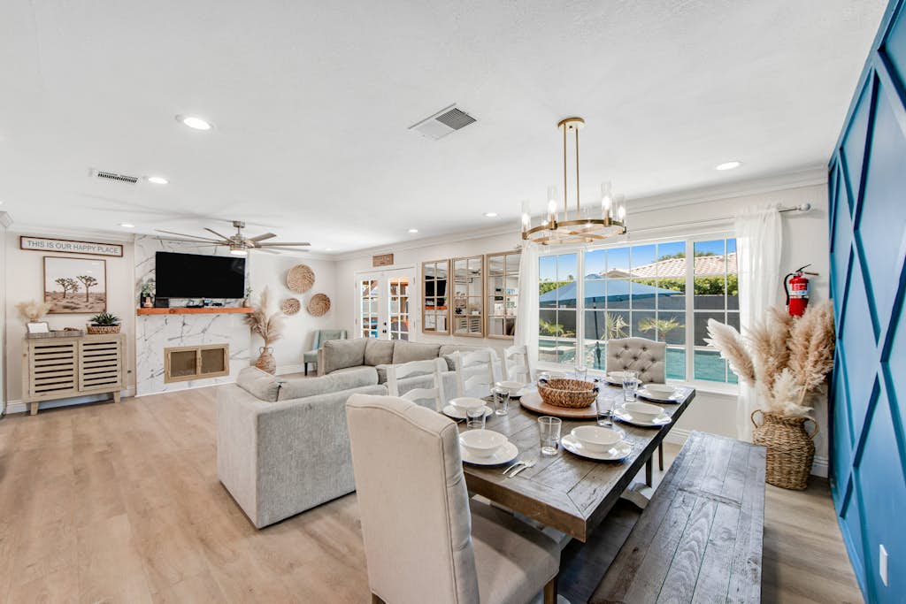 Designer dream with fireplace, game room, private pool, outdoor kitchen, firepit