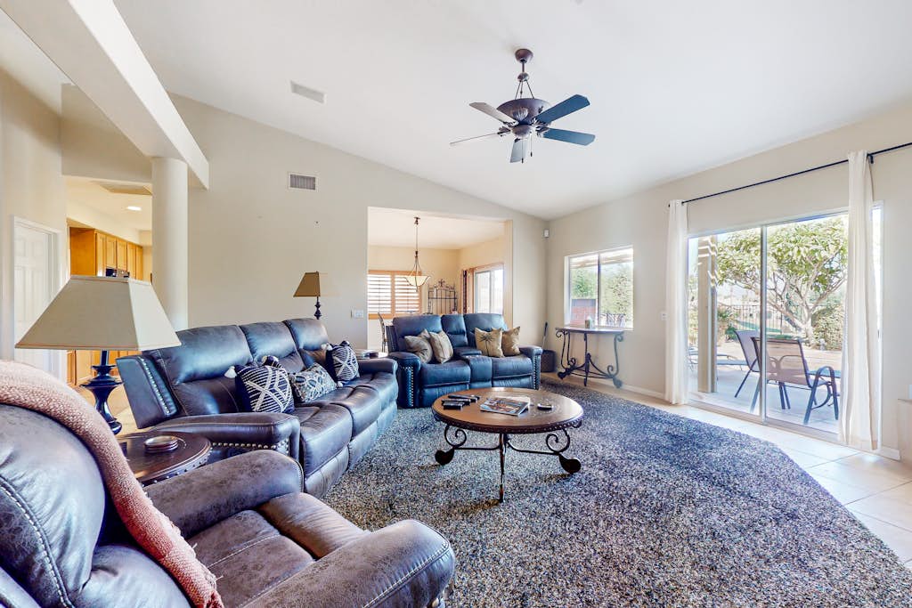 Snowbird-friendly house with mountain view, pool, on-site golf, and central AC