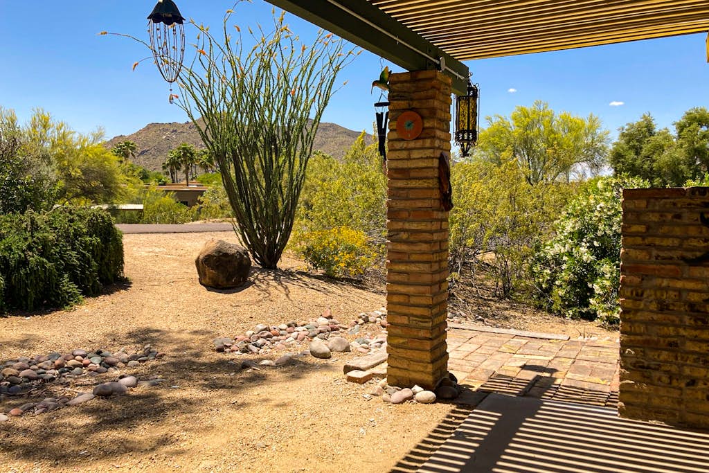 Ground-floor condo with on-site pool, grills, patio, & central AC