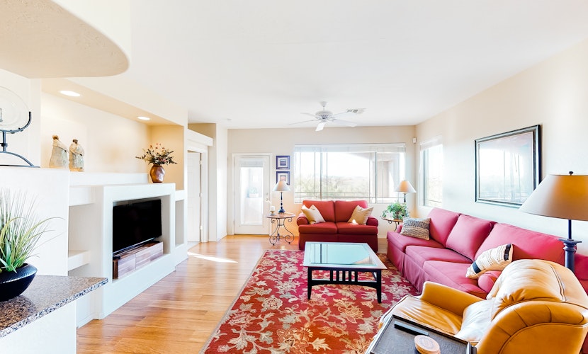 Serene mountain view condo with balcony, patio, washer/dryer, & board games