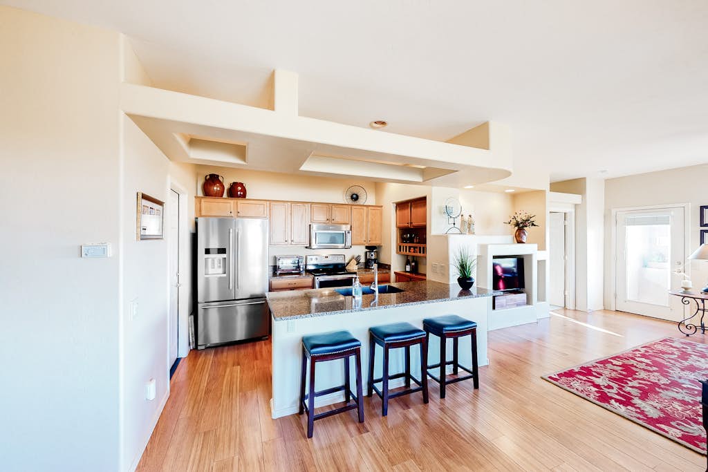 Serene mountain view condo with balcony, patio, washer/dryer, & board games