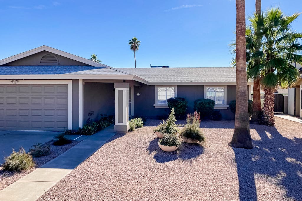 Charming desert stay with enclosed yard, pool, chef's kitchen, smart TVs, & W/D
