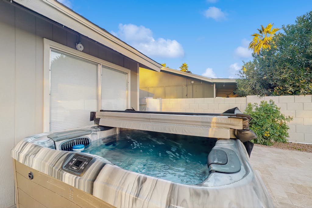 Charming desert stay with enclosed yard, pool, chef's kitchen, smart TVs, & W/D