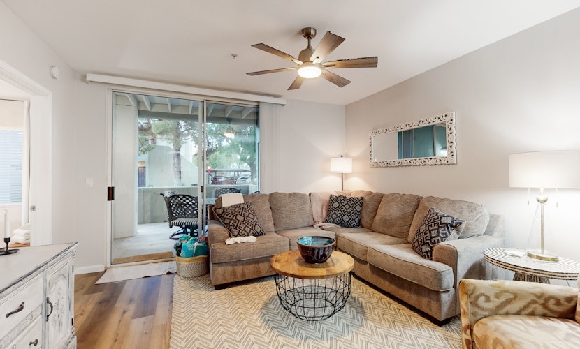 Ground-floor condo with on-site pool, pickleball, hot tub, gym & private balcony