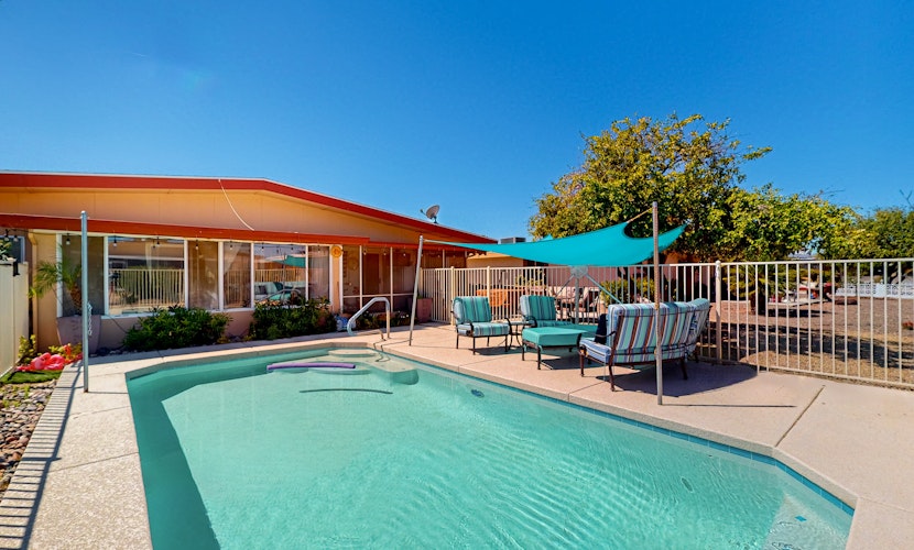 Dog-friendly home with private pool, yoga studio, fitness room & great patio