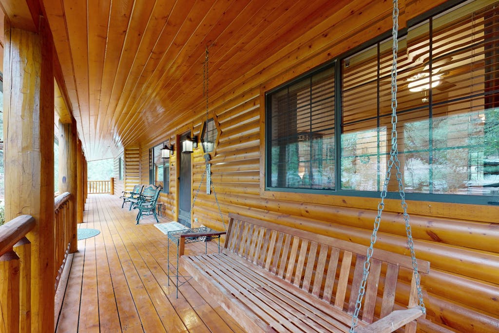 Two-story home with game room, large deck, bbq grill, & yard