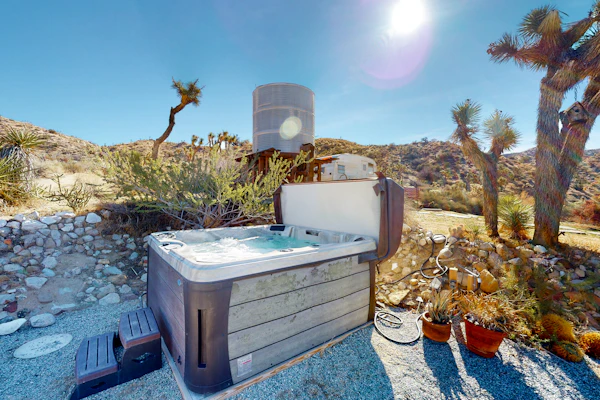 Secluded hilltop home with hot tub, cowboy pool, & amazing views