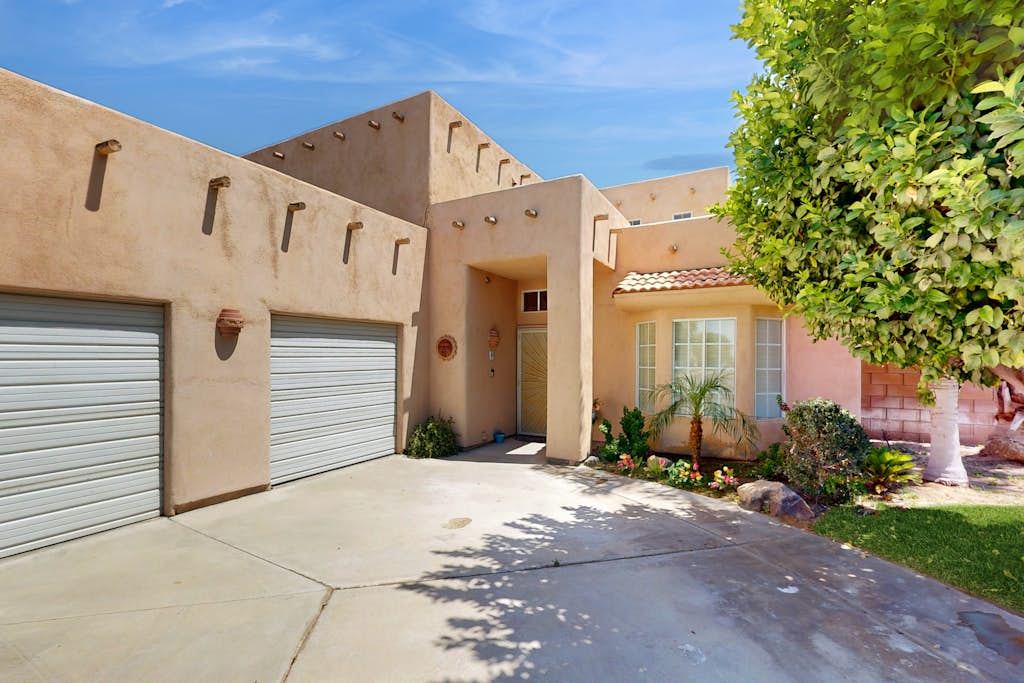 Expansive home with fireplace, heated pool & and spa in backyard haven