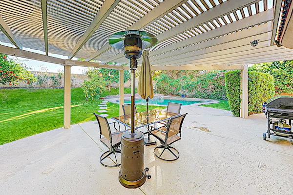 Expansive home with fireplace, heated pool & and spa in backyard haven