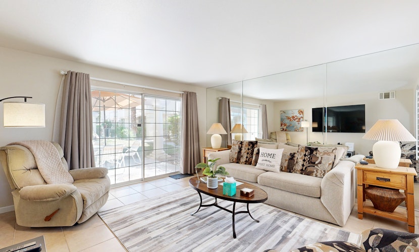 Sunny condo with a pool, hot tub, washer/dryer, central AC & patio