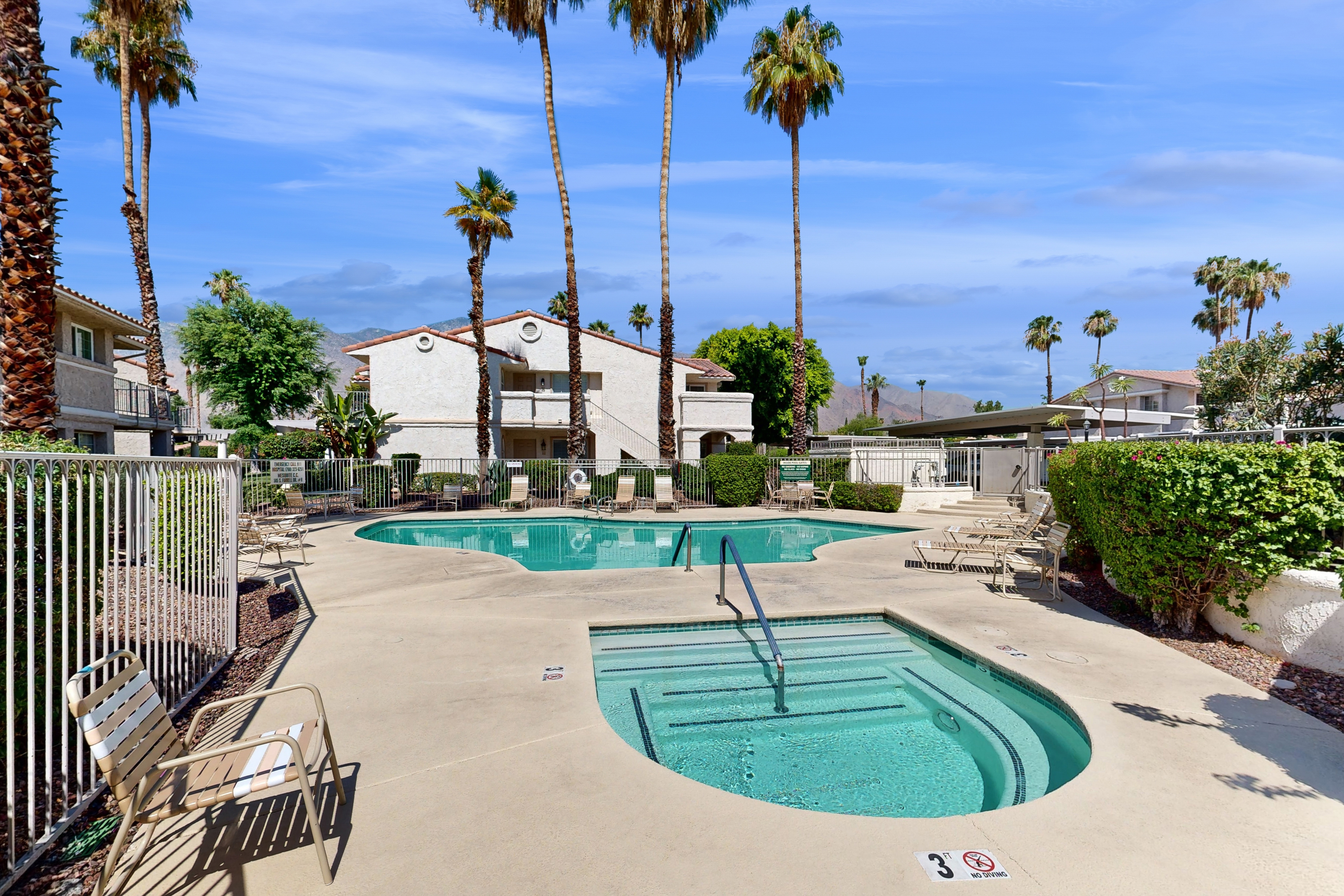 Sunny condo with a pool, hot tub, washer/dryer, central AC & patio