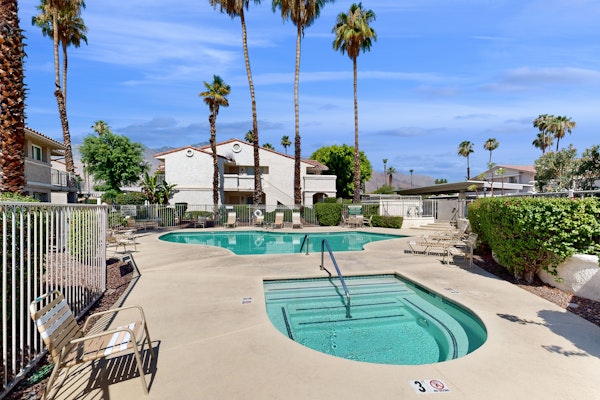 Sunny condo with a pool, hot tub, washer/dryer, central AC & patio