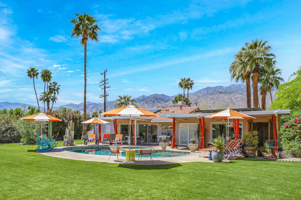 Colorful home with stunning backyard, pool, spa, WiFi, central AC, and fireplace