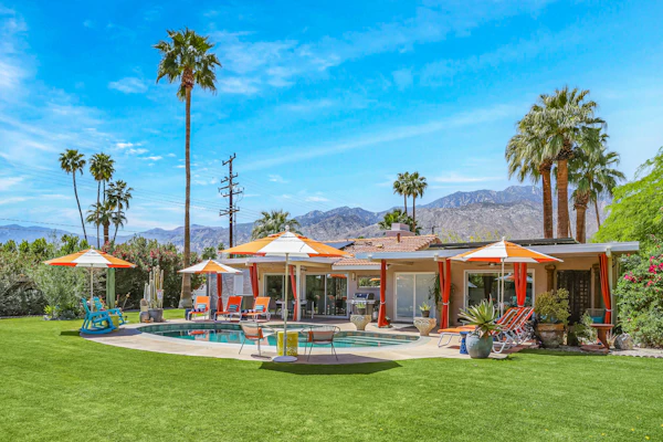 Colorful home with stunning backyard, pool, spa, WiFi, central AC, and fireplace