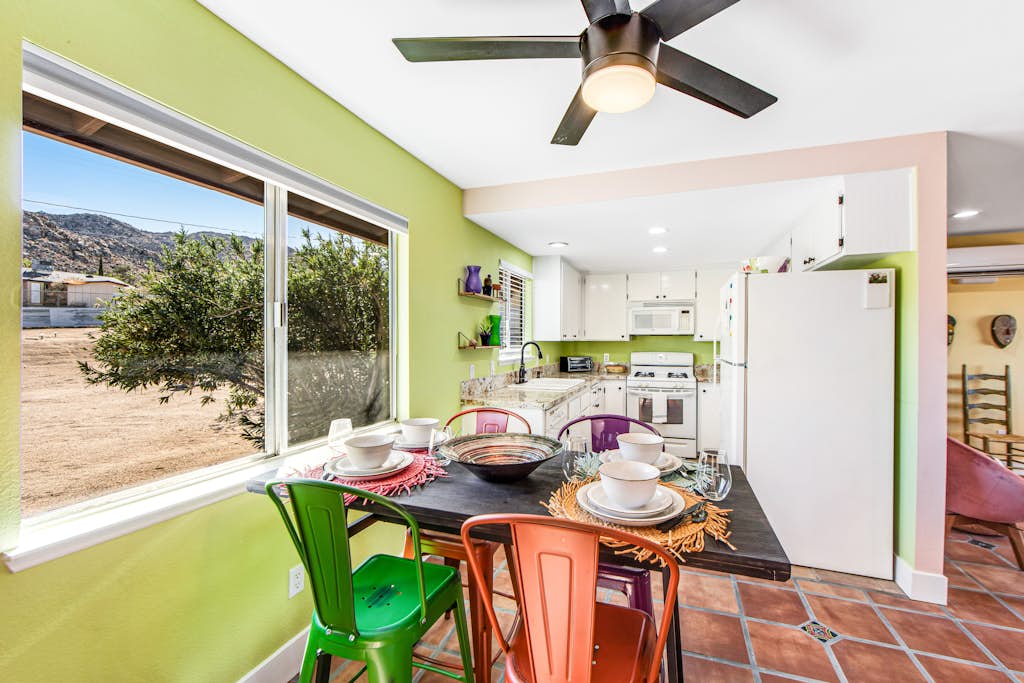 Centrally located dog-friendly desert home with swing set, books & enclosed yard