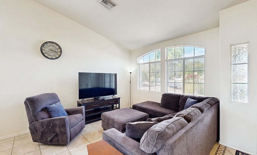 Sun-filled dog-friendly home with private pool, putting green, & mountain views