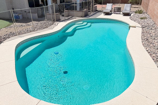 Sun-filled dog-friendly home with private pool, putting green, & mountain views