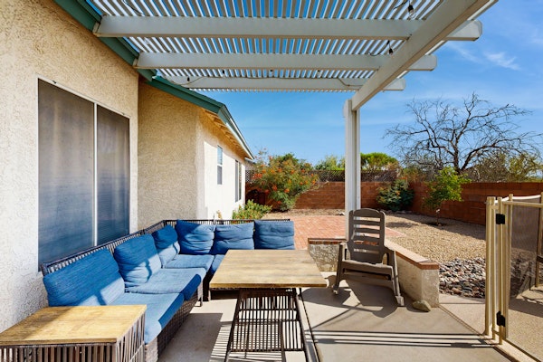 Sun-filled dog-friendly home with private pool, putting green, & mountain views